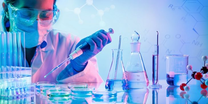 Chemistry Laboratory – Woman With Pipettes And Test Tubes